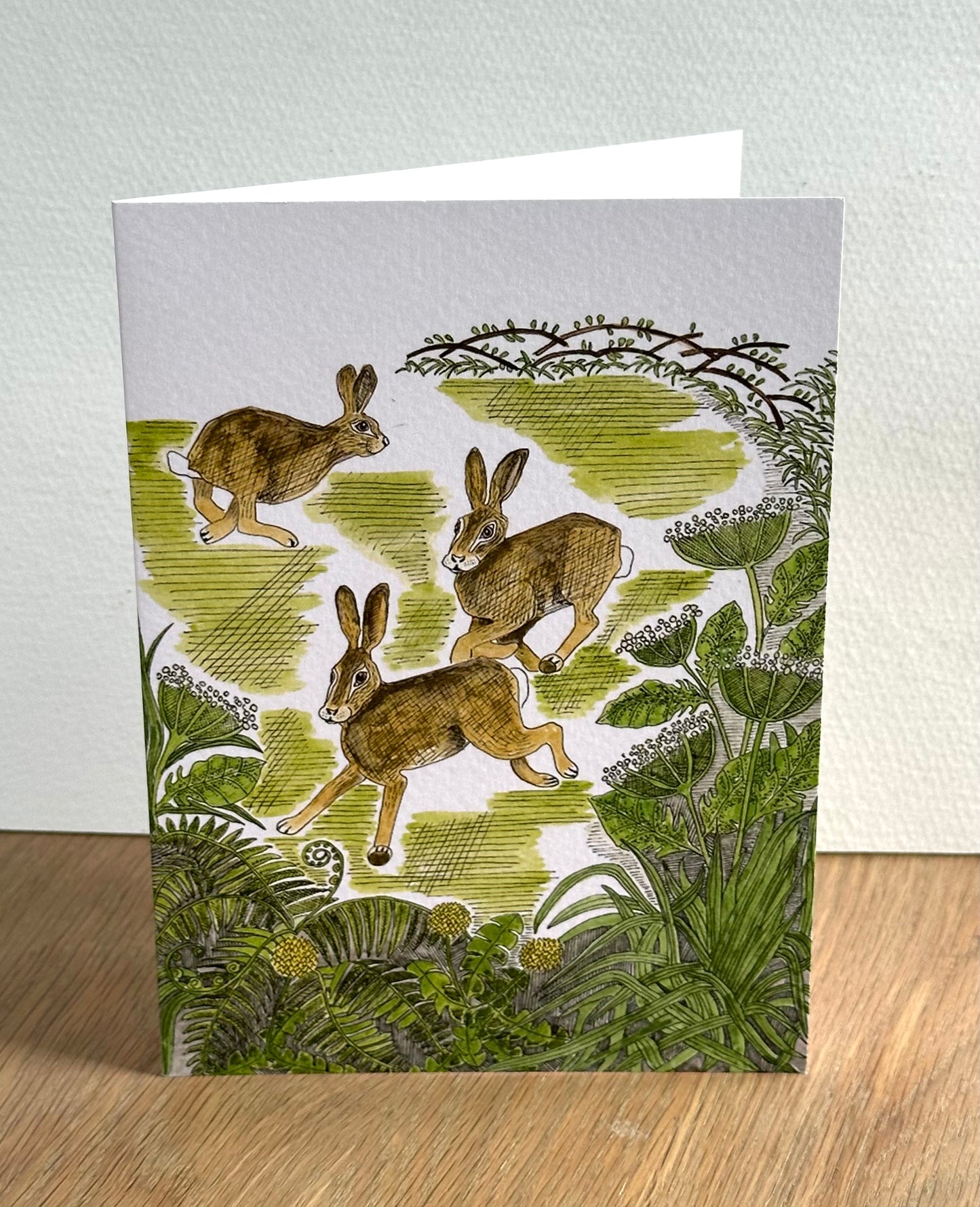 Frolicking Hares Greeting Card - British Countryside Wildlife Illustration Design