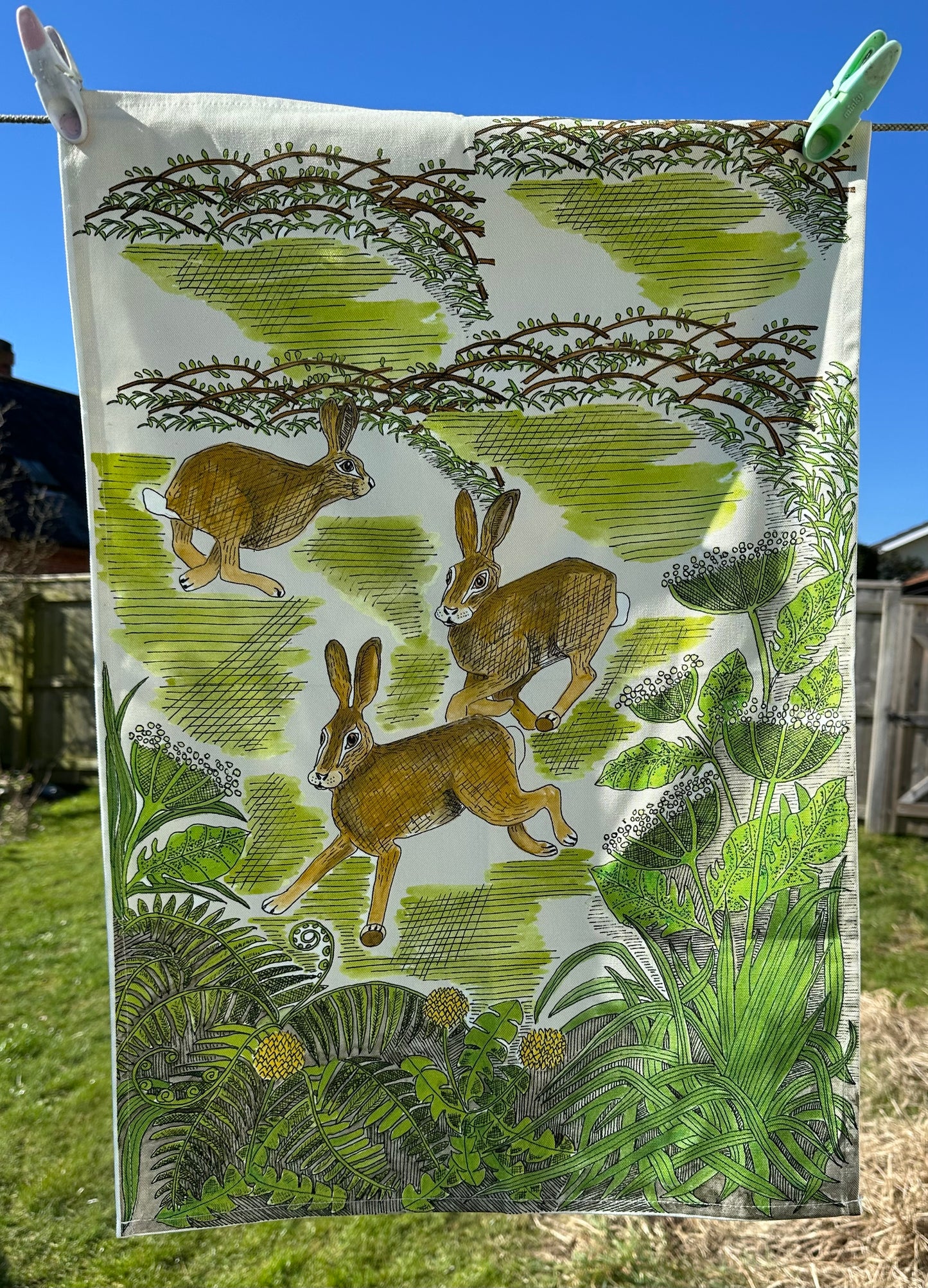 Frolicking Hares Tea Towel