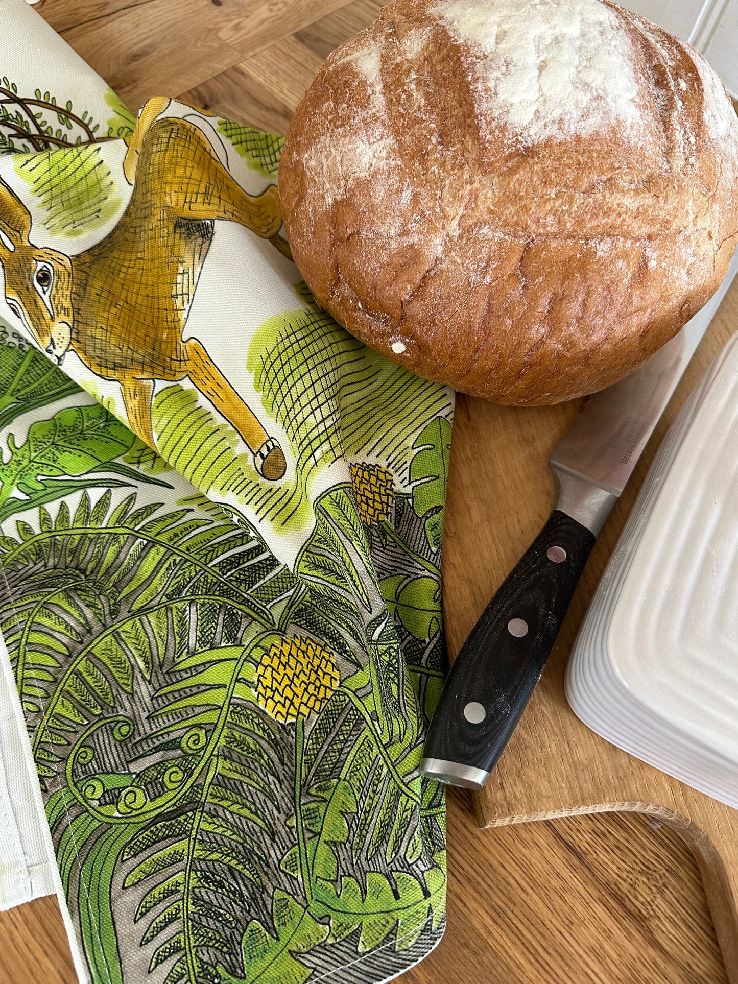 Frolicking Hares Tea Towel