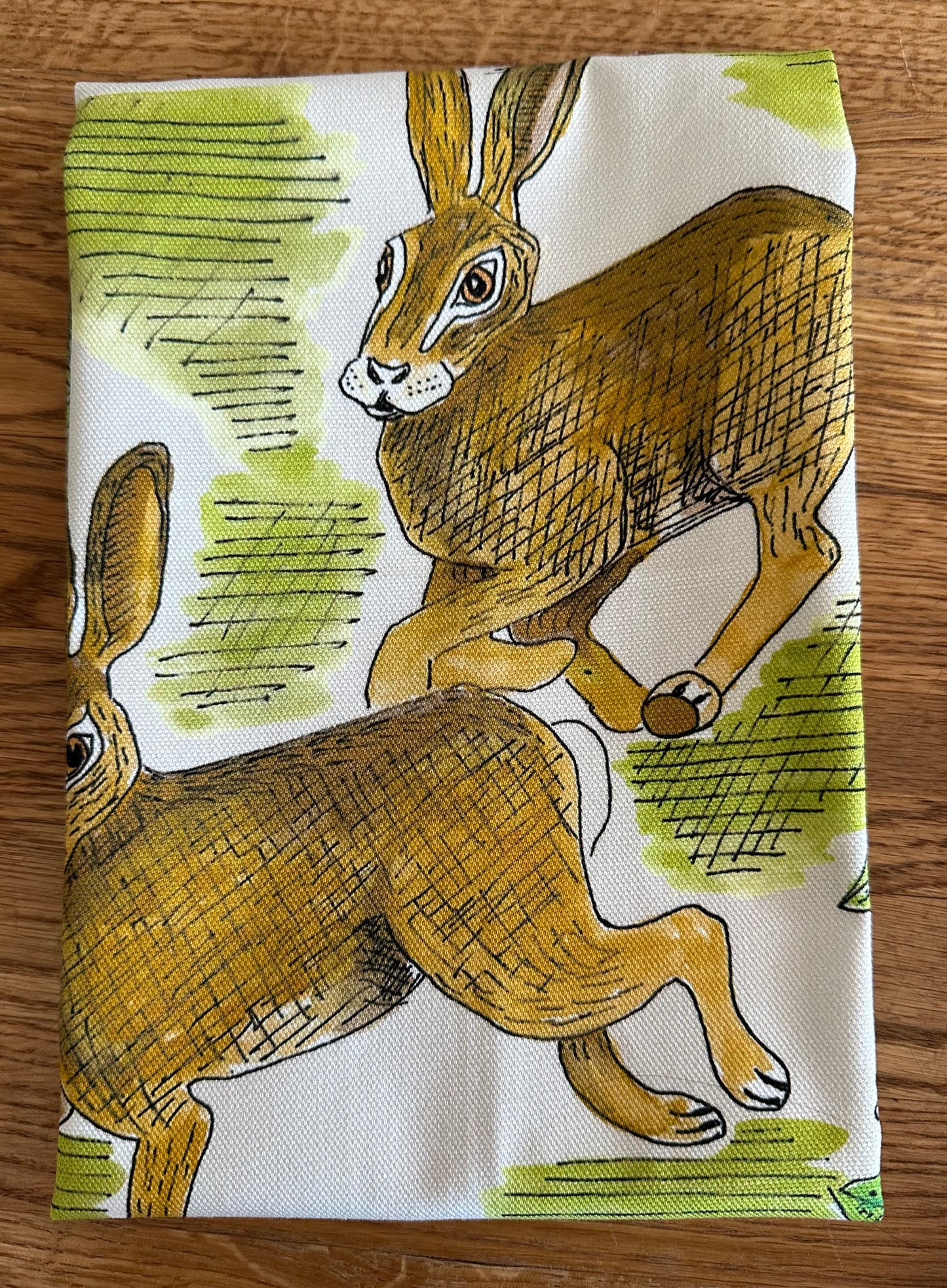 Frolicking Hares Tea Towel